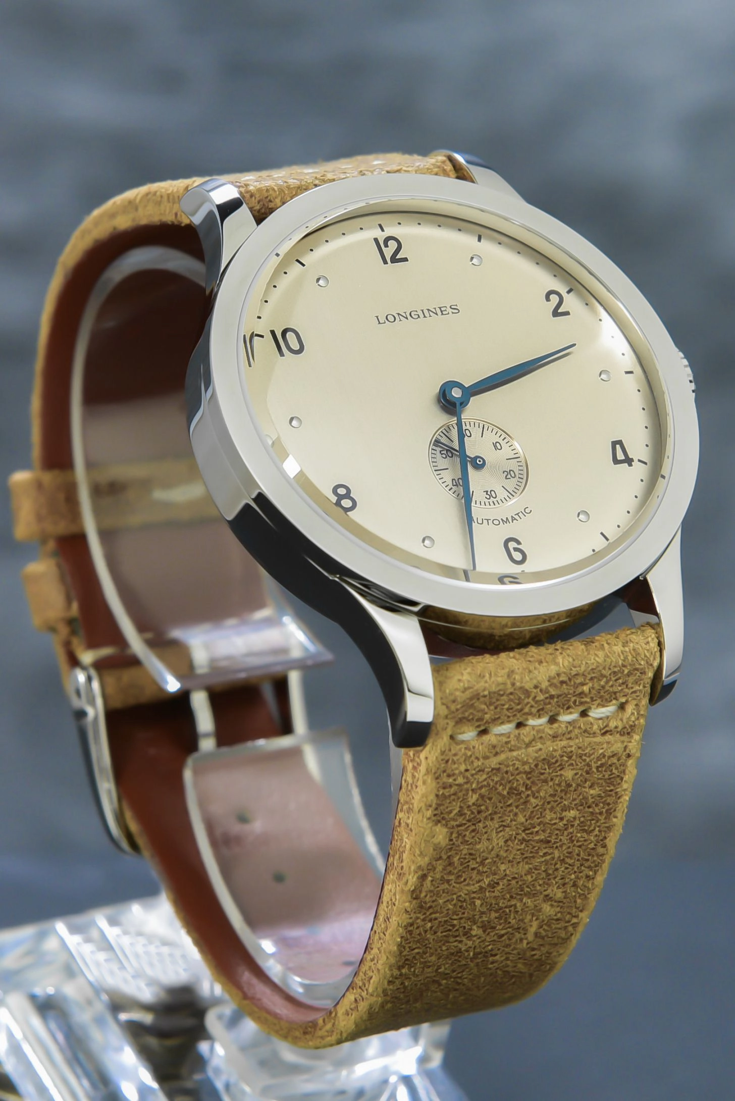 Longines Heritage 1945 features a salmon brushed dial flat bezel